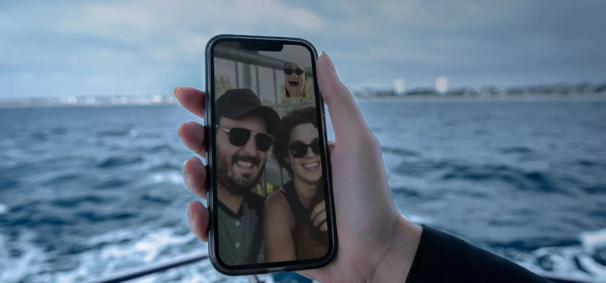 Phone on a video call on a boat